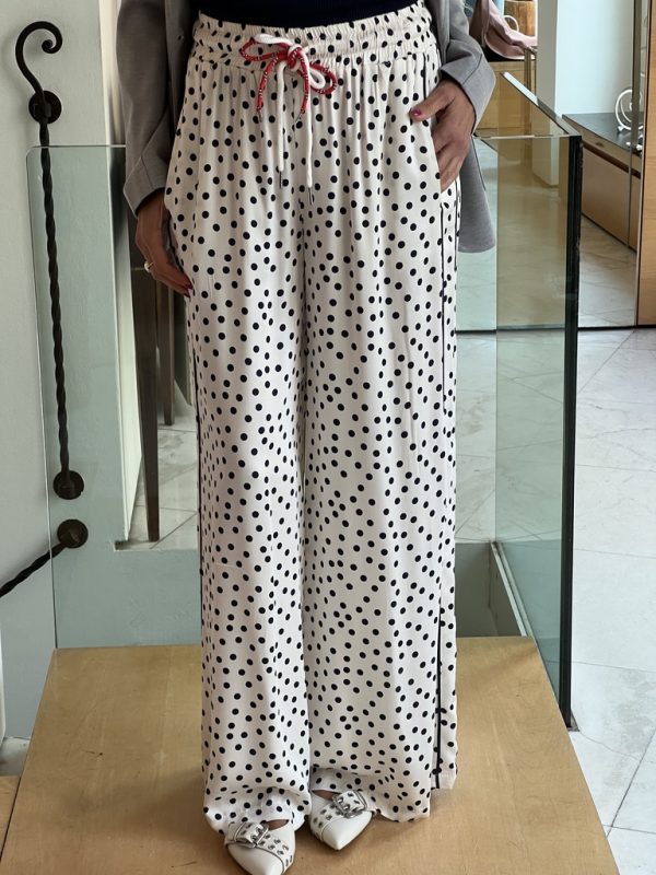 Pantalone palazzo bianco pois blu