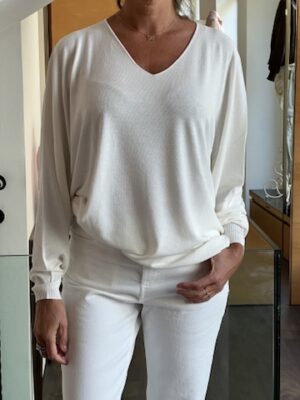 Scollo a v over latte